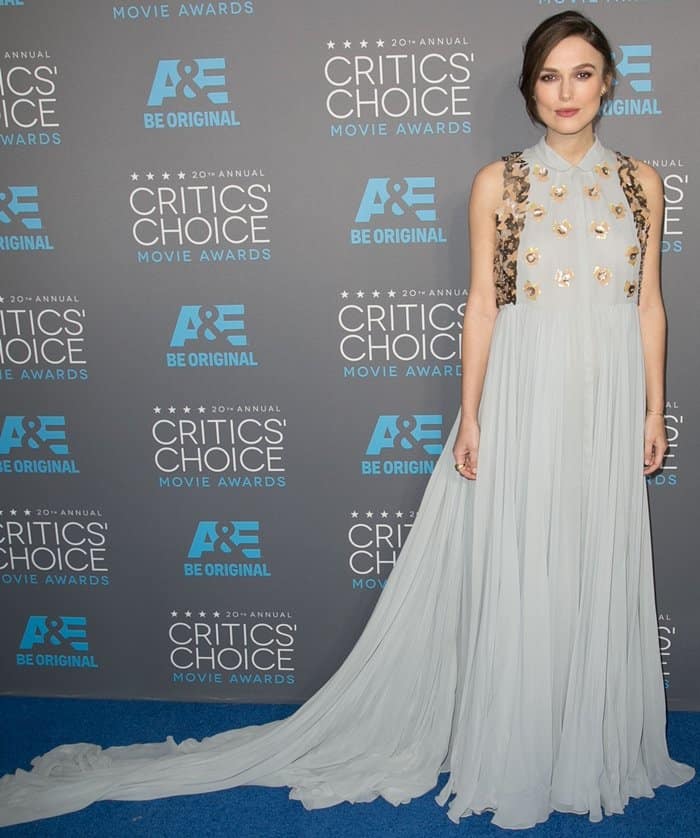 Keira Knightley's gown was a light grey-blue color with a flowy silhouette, a sweeping train, and eye-catching embellishments, including her signature collar detail