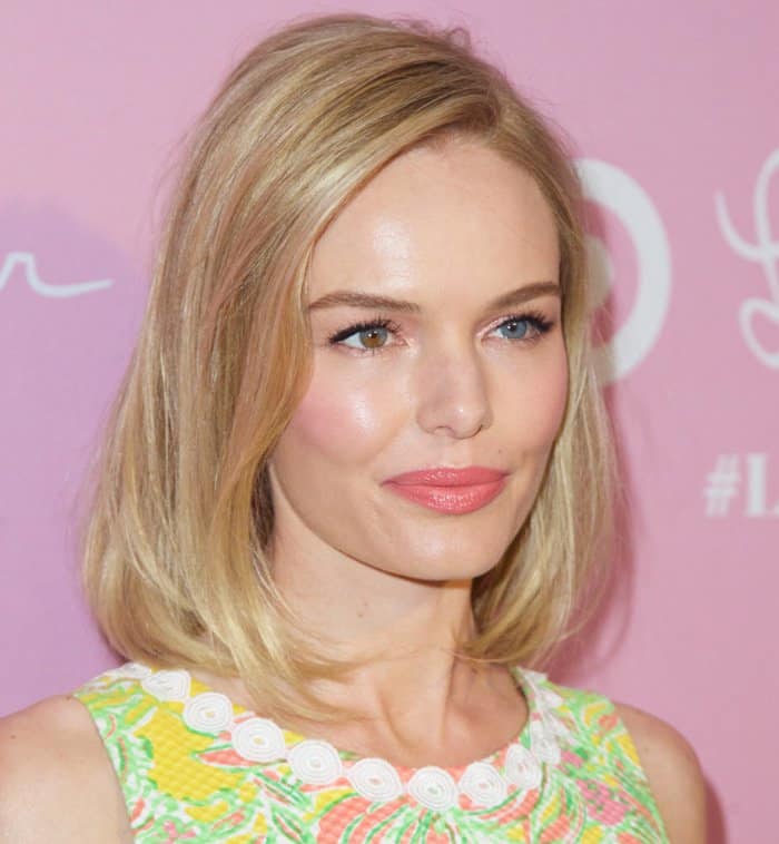 Kate Bosworth's blonde locks styled into a flick with a soft pink lip completing her retro-inspired look