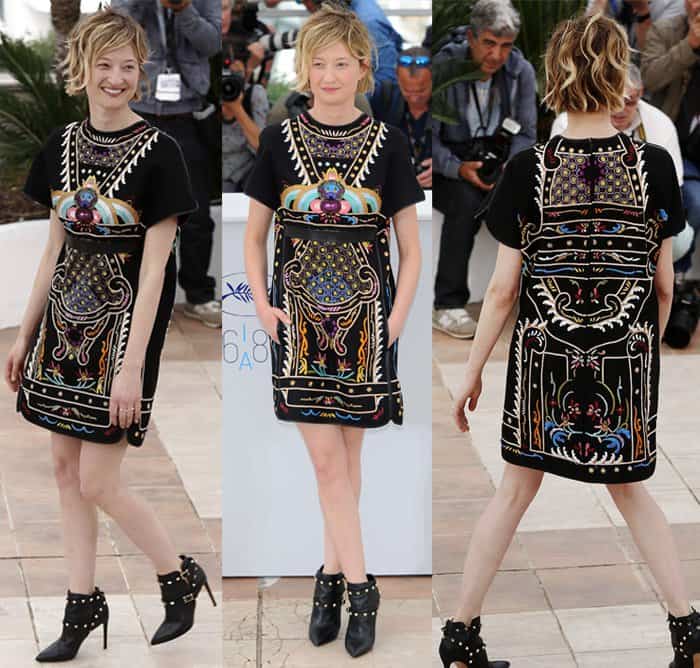 Alba Rohrwacher wore a black embroidered Valentino Fall 2015 dress with a pair of black studded Valentino 'Rockstud' boots for the photocall of 'Il Racconto Dei Racconti' at the 2015 Cannes Film Festival