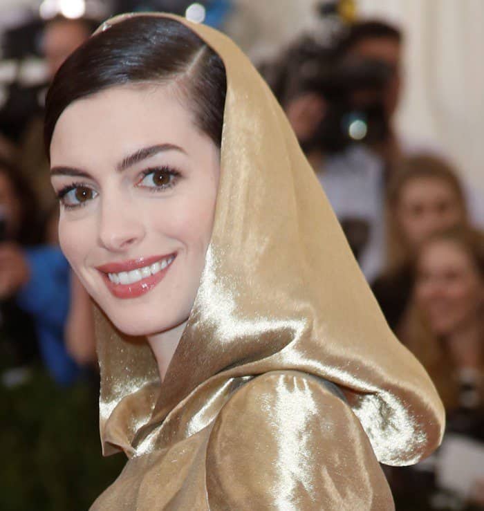 Anne Hathaway's dress is made of fabric from actual metal fibers that were milled in Italy