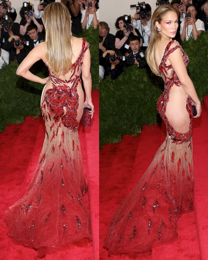 Jennifer Lopez in an embellished one-shoulder gown by Atelier Versace featuring a fire-breathing dragon