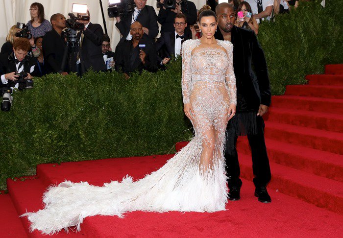 Kim Kardashian and Kanye West hit the red carpet at the 2015 Met Gala held at the Metropolitan Museum of Art in New York City on May 4, 2015