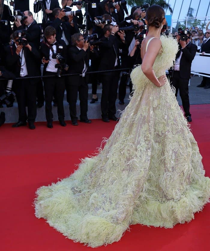 Sonam Kapoor graced the 'Inside Out' premiere during the 68th annual Cannes Film Festival in France, sporting a bold lime-green Elie Saab Spring 2015 Couture gown and stunning Chopard jewels