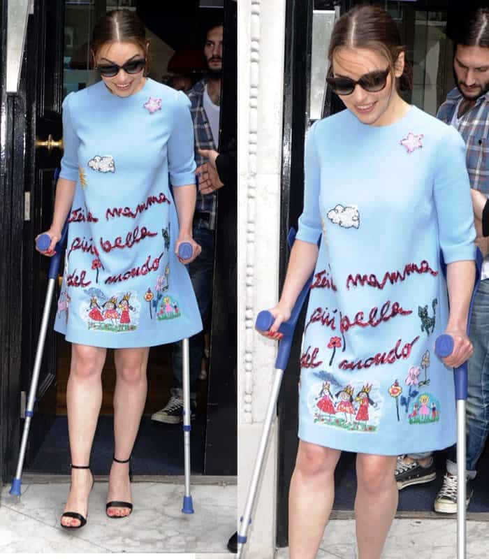 Emilia Clarke used a pair of crutches to promote her movie Terminator Genisys in London