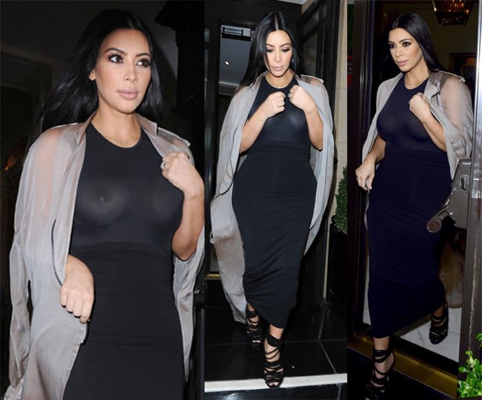 Kim Kardashian leaves her hotel wearing a sheer dress that reveals her breasts