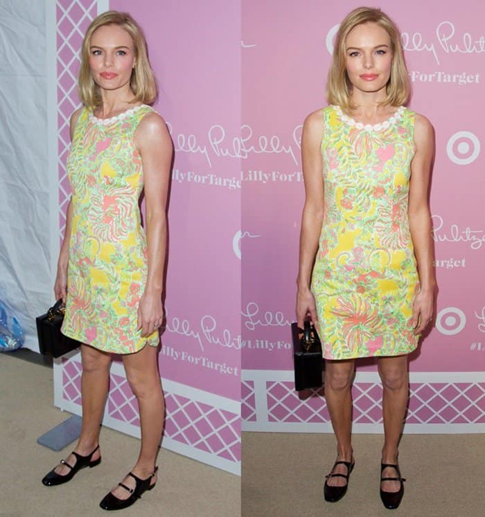 Kate Bosworth in a playful and charming floral dress paired with a sophisticated Mark Cross bag