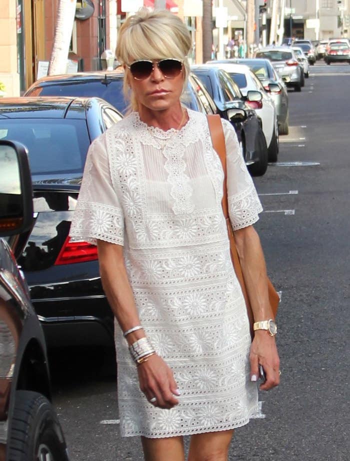 Kristin Chenoweth shows why the little white dress remains an ideal choice for running errands as it exudes elegance, regardless of how you style it