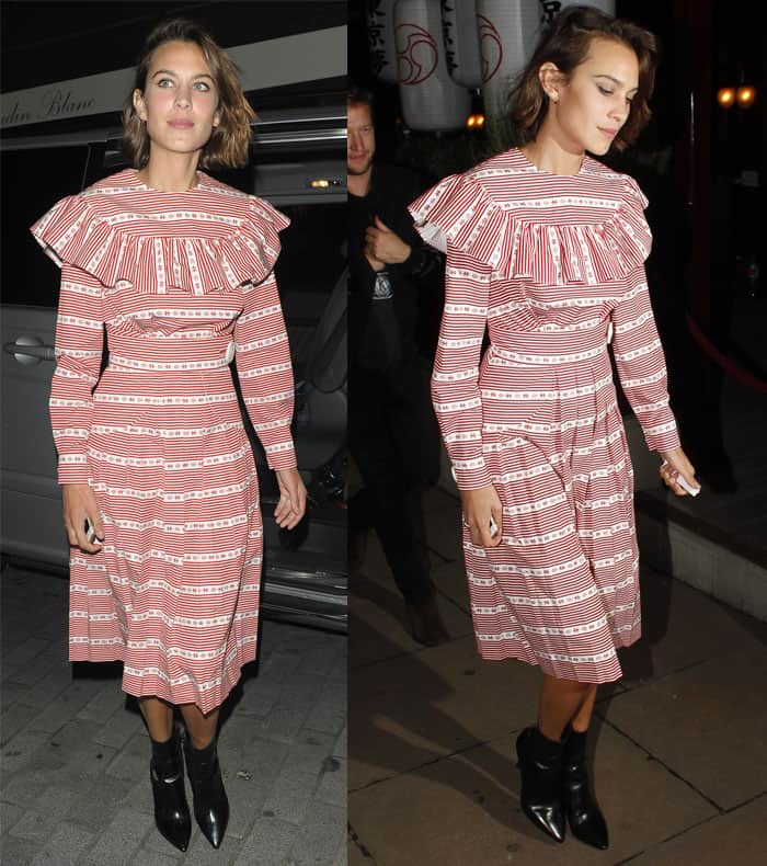 Alexa Chung sported a charming striped dress from the Miu Miu F/W 2015 collection, which boasted a lovely red and white pattern and a dainty bib collar