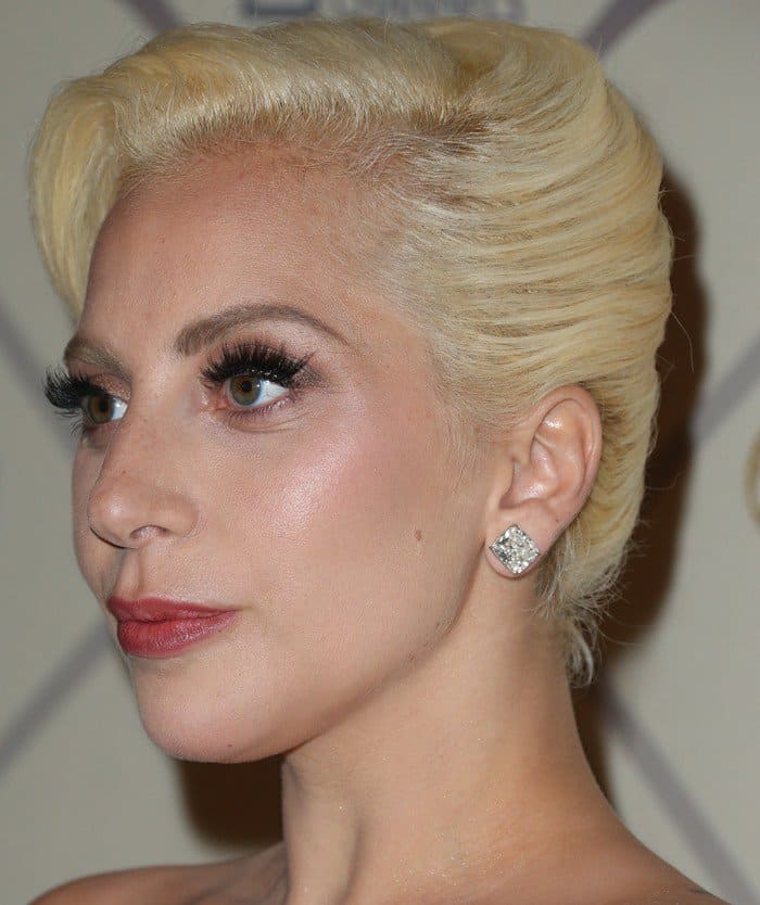 Lady Gaga shows off her diamond statement earrings and a blonde bob at the Fox After Party following the 2015 Emmy Awards