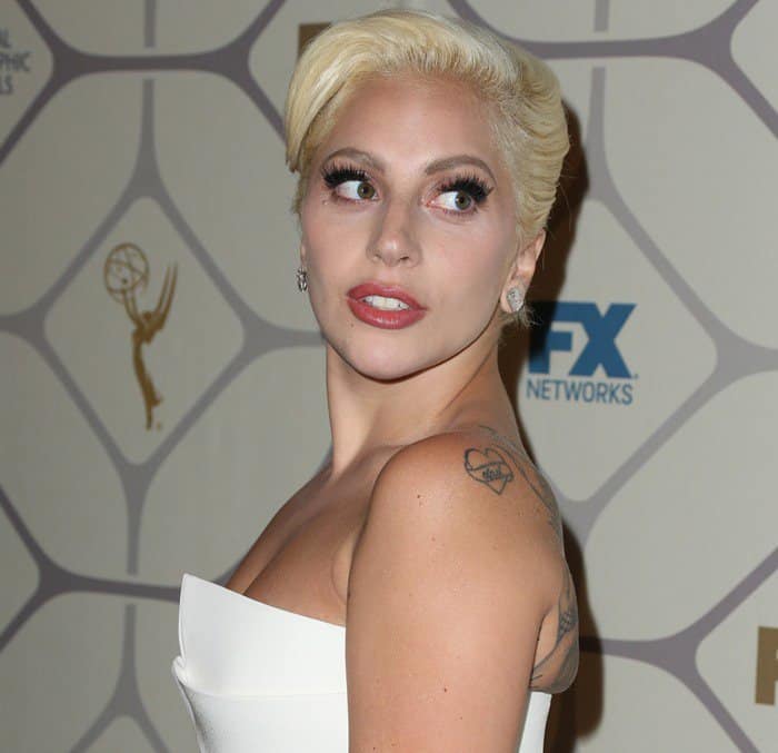 The strapless neckline highlighted Lady Gaga's toned arms and shoulders, while the dress hugged her curves in all the right places