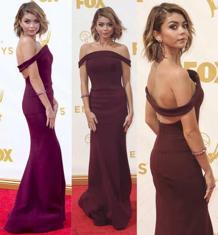 Sarah Hyland stunned on the red carpet in a red wine-colored floor-length gown by Zac Posen at the 67th Annual Primetime Emmy Awards