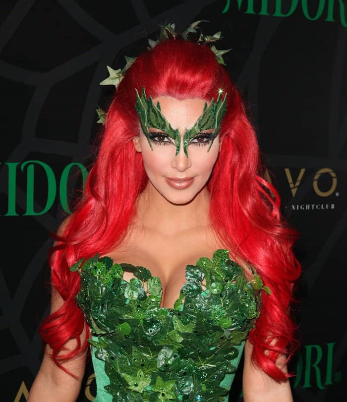 Kim Kardashian even put on a bright red wig for her Poison Ivy costume