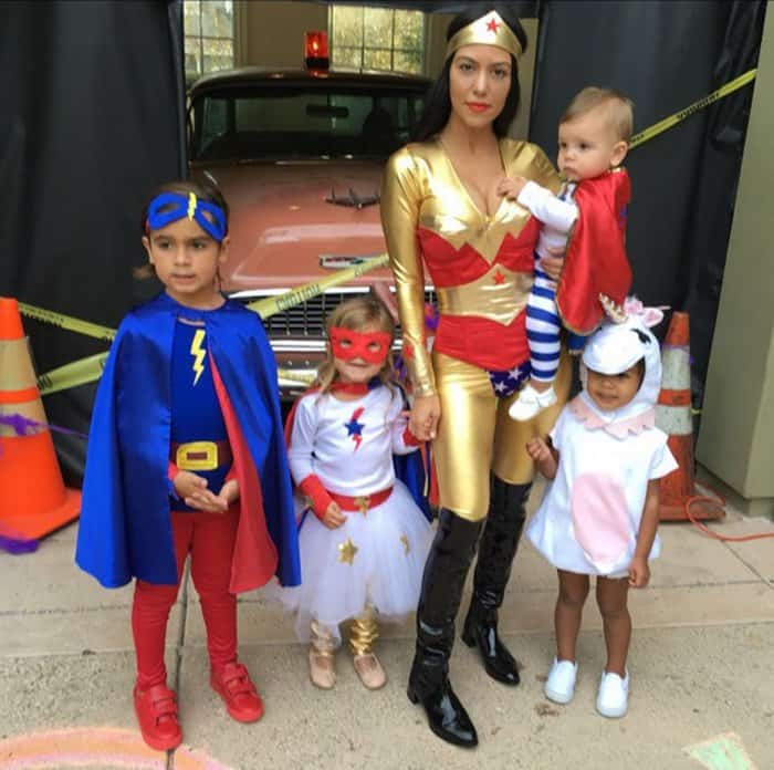 Kourtney Kardashian's superhero squad included her children: Mason, aged five, Penelope, aged three, 10-month-old Reign, and niece North West