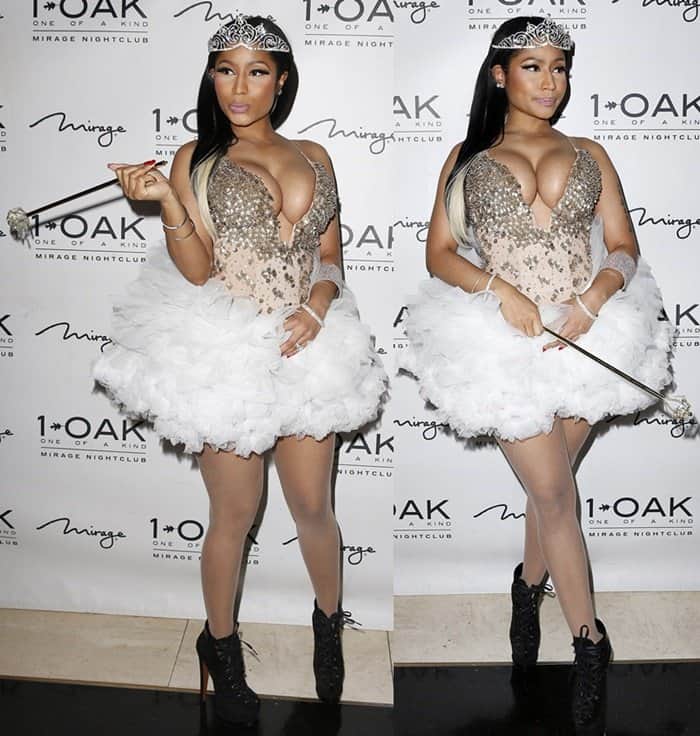Nicki Minaj showcased her stunning curves in a jewel-encrusted corset featuring a daring plunging neckline, complemented by a fluffy tutu