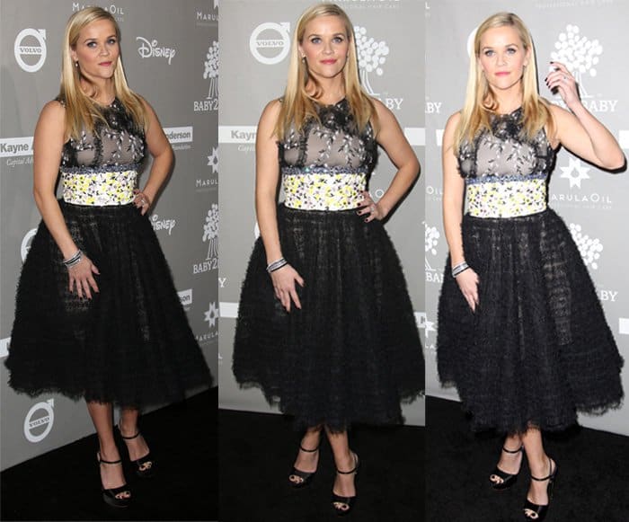 Reese Witherspoon embraced a '50s-inspired fashion aesthetic with her multi-patterned black and floral dress