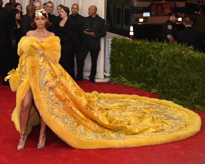 Rihanna's dress, which was made from lots of gold thread and fox fur, took about 20 months to construct and weighed around 55 pounds