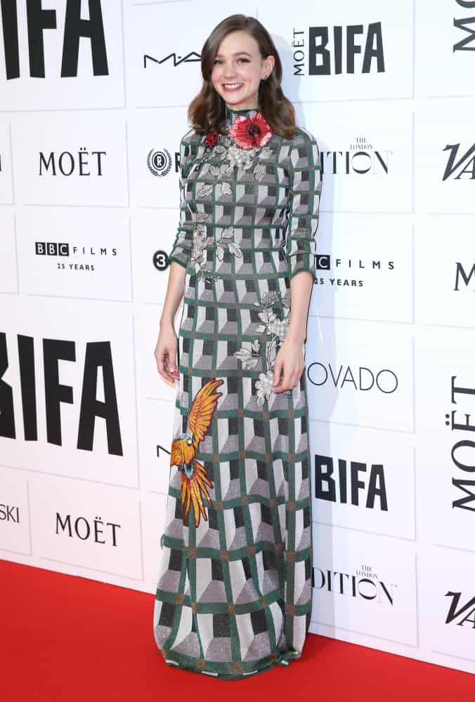 Carey Mulligan is known for having a modest taste of dress, and at the 2015 British Independent Film Awards, the actress amplified this image in 3/4 sleeves and a high collared, floor-length gown