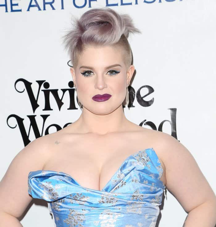 Kelly Osbourne wore a very low-cut blue and silver strapless dress by Vivienne Westwood, which posed a risk of wardrobe malfunction