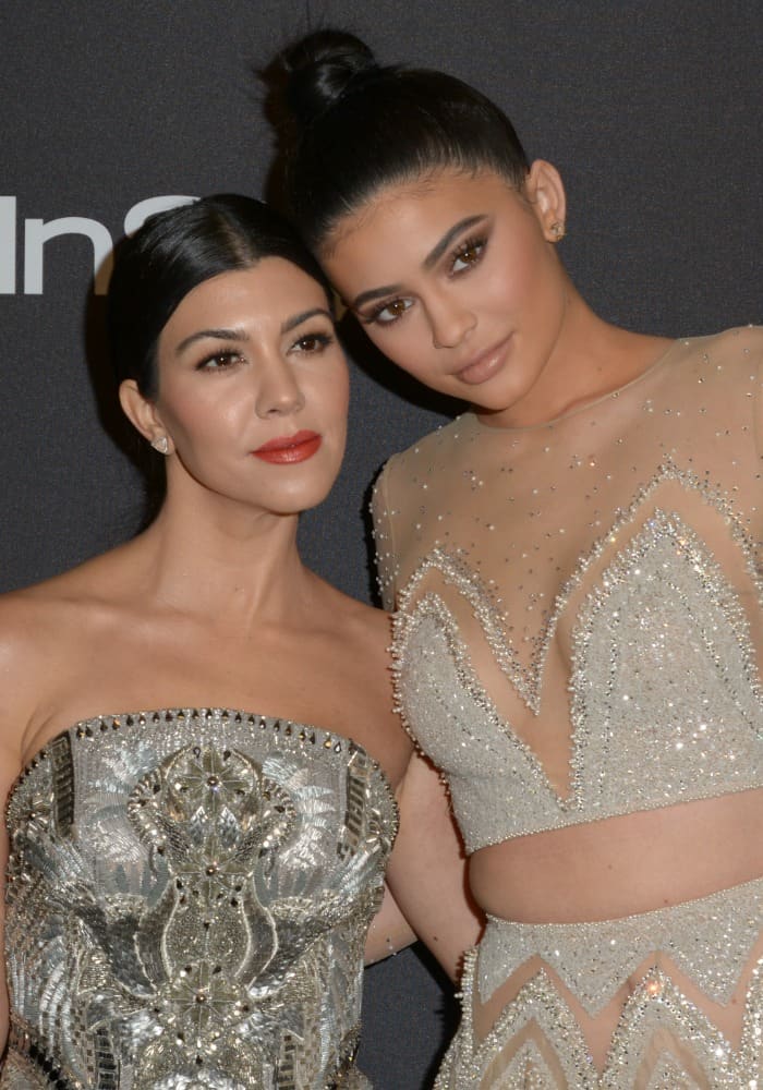 Sisters Kourtney Kardashian and Kylie Jenner stole the spotlight at the InStyle/Warner Bros. Golden Globe after-party, exuding undeniable glamour