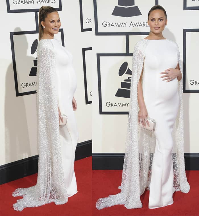 Chrissy Teigen looked stunning in a white cap sleeve dress with a beaded cape and a back split at the 58th Annual Grammy Awards