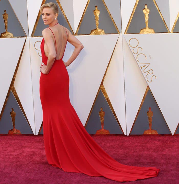 Charlize Theron turned heads at the 2016 Oscars with her striking red Christian Dior gown, which was custom-made for her