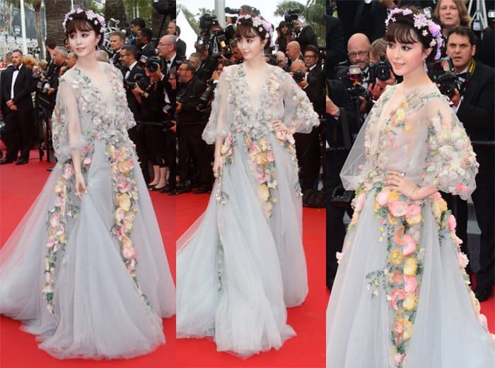 Fan Bingbing donned an exquisite Marchesa Spring 2015 dusty grey tulle gown that featured billowing sleeves and delicate pastel multi-colored feathers