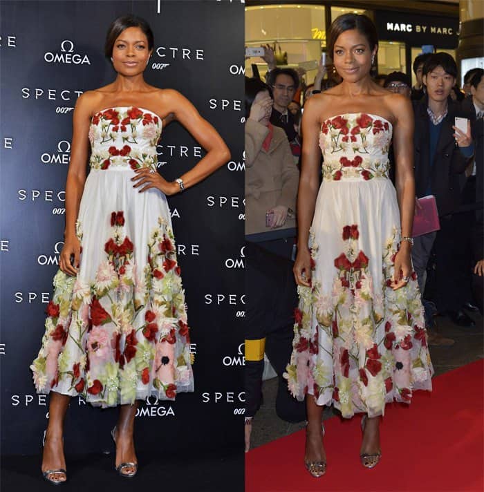 Naomie Harris paired the elegant gown with strappy silver stilettos and large earrings at the ‘Spectre’ Tokyo photocall held at Yurakucho Marion in Japan