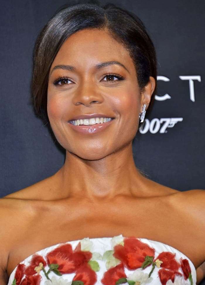 Naomie Harris looked absolutely elegant in a stunning white strapless dress adorned with intricate floral embellishments
