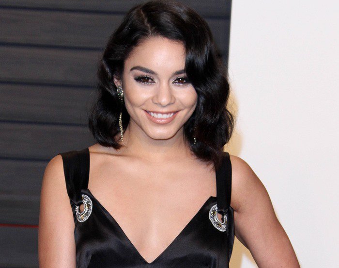Vanessa Hudgens showcasing her toned arms in a sleeveless design at the 2016 Vanity Fair Oscar Party