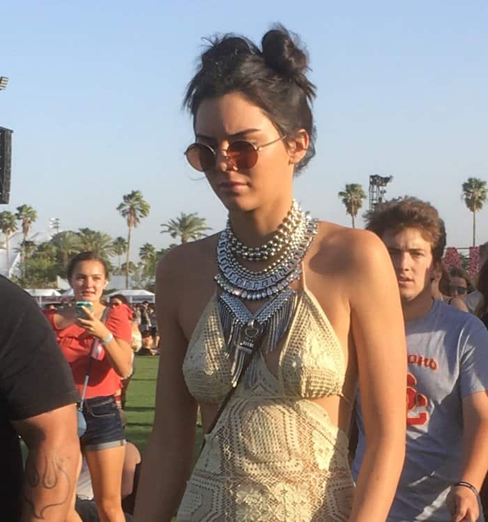 Kendall Jenner's crocheted dress was perfect for the festival atmosphere, and the layers of necklaces and sandals added a touch of glamour