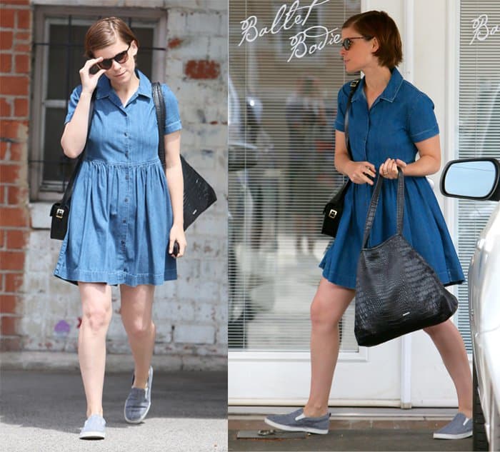 Minimalist in her approach to accessories, Kate Mara opted for a black purse, an oversized bag, and stylish shades