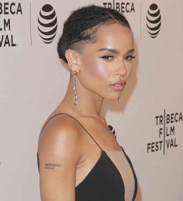 Zoë Isabella Kravitz accessorized with chain-link earrings and showcased her signature style with her septum ring