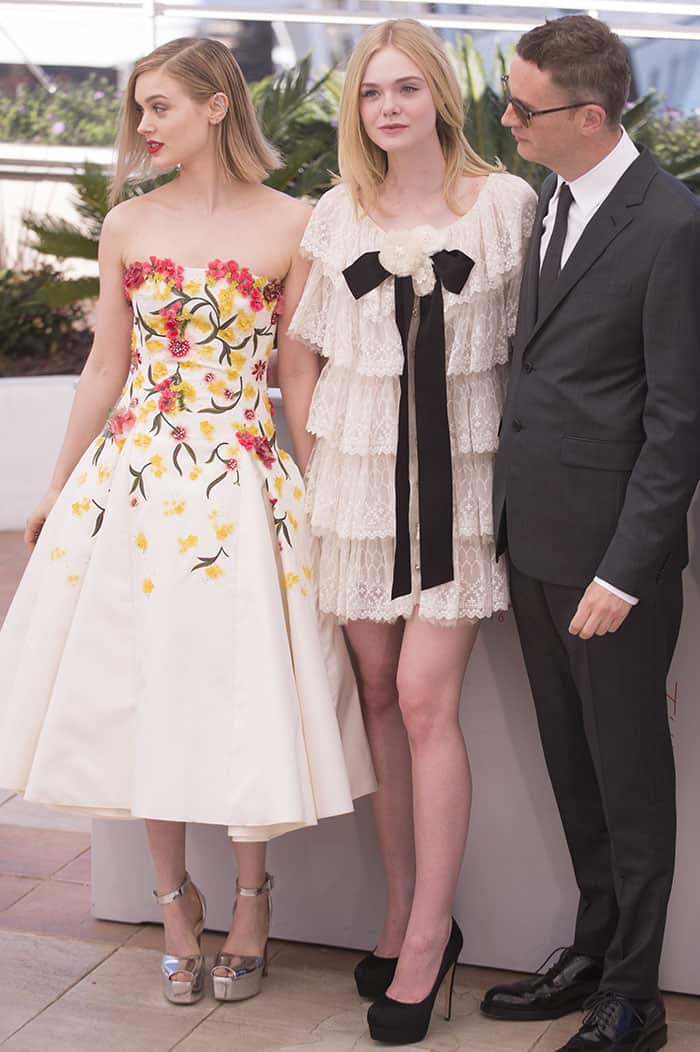 Bella Heathcote, Elle Fanning, and Nicolas Winding Refn worked together on the 2016 psychological horror film The Neon Demon