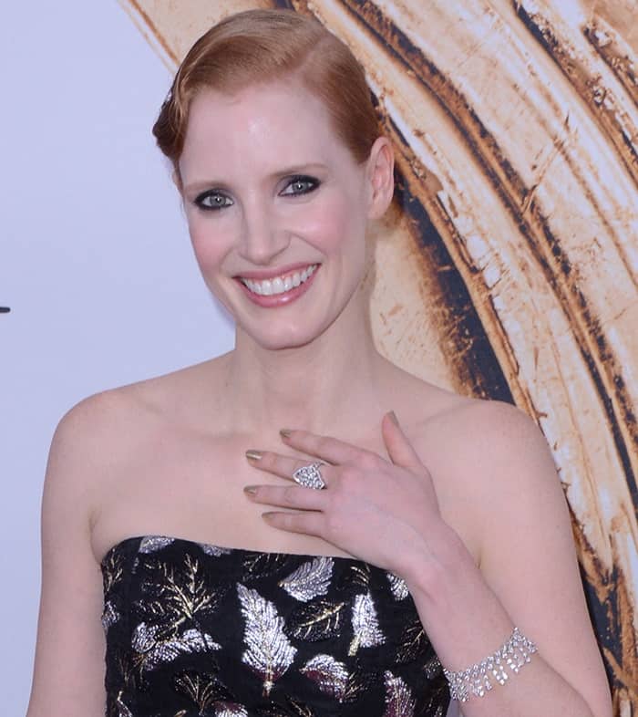 Jessica Chastain sported a polished side-parted wavy up-do that exuded sophistication, perfectly paired with a smoky eye that added a touch of allure