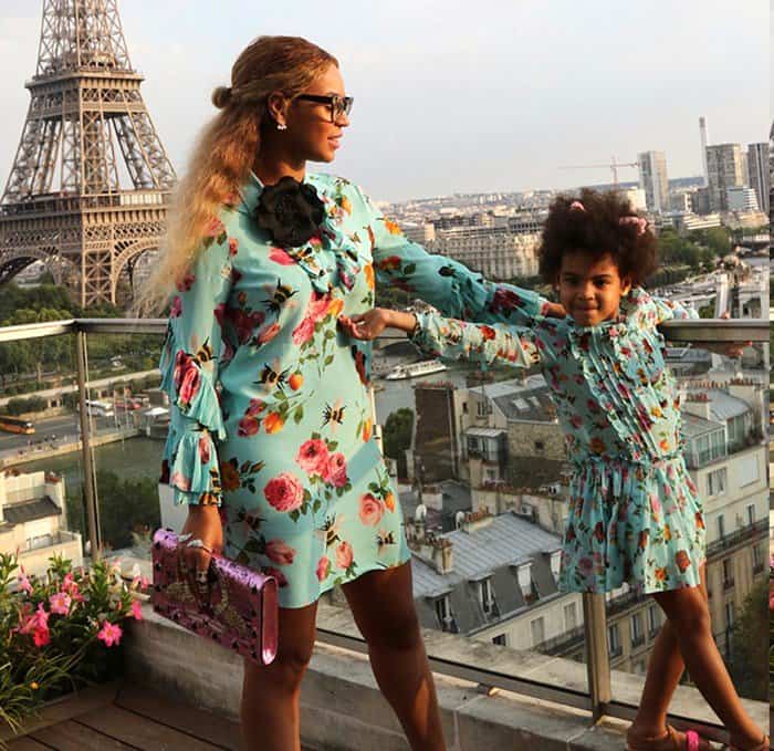 Beyonce and Blue Ivy in matching Gucci floral dresses paired with pink sandals