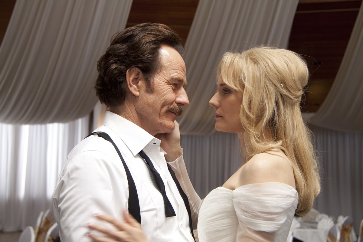 Bryan Cranston as US Customs Special Agent Robert Mazur / Bob Musella and Diane Kruger as Kathy Ertz in the 2016 American biographical crime drama thriller film The Infiltrator
