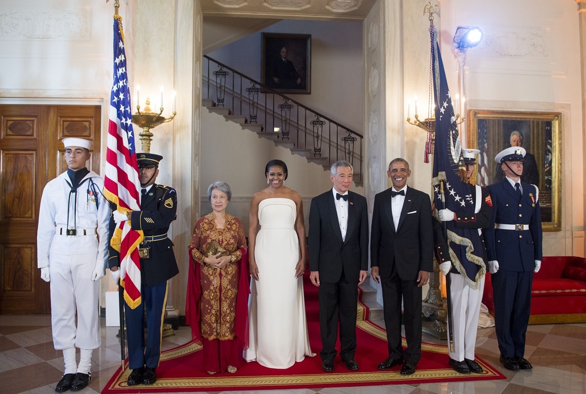 Ho Ching, first lady Michelle Obama, Prime Minister Lee Hsien Loong of Singapore, and U.S. President Barack Obama pose for photographs in the White House