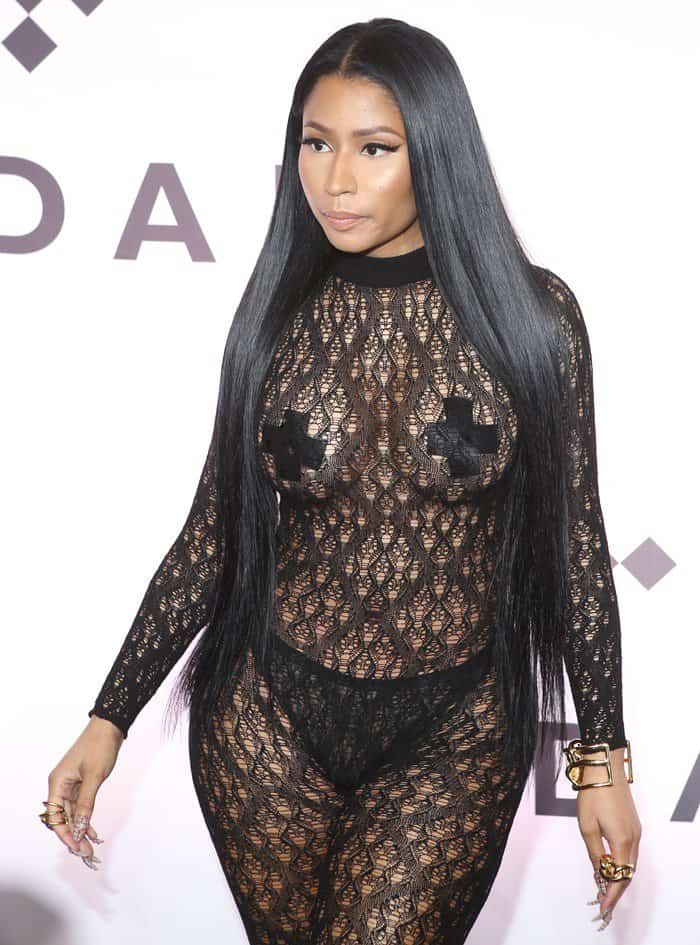 Nicki Minaj relying only on pasties and black underwear for a cover-up