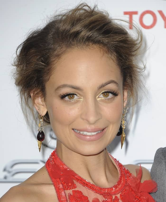 Nicole Richie completed her look with a tousled updo and adorned herself with several exquisite pieces of Neil Lane jewelry