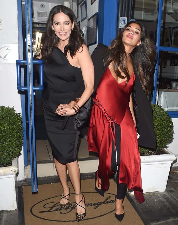 Nicole Scherzinger exhibited noticeable signs of intoxication following a night of revelry at Simon Cowell's birthday celebration, requiring the assistance of Lauren Silverman for stability as they departed from the event