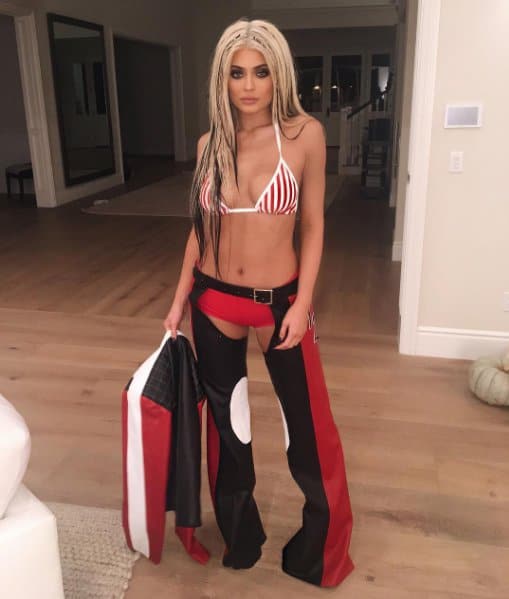 Kylie Jenner dresses as Christina Aguilera in the “Dirrty” music video for Halloween