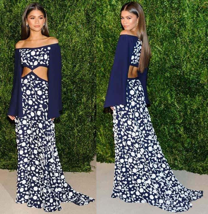 Elegantly draped in a Michael Kors Spring 2017 navy & white floral beaded gown, Zendaya showcased the dress's full-length design, complemented by airy chiffon sleeves and a tantalizing cut-out waist
