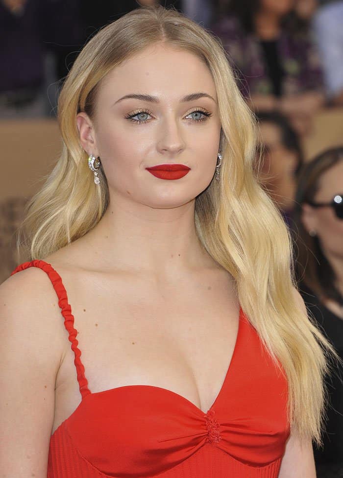 Sophie Turner in a sexy red dress