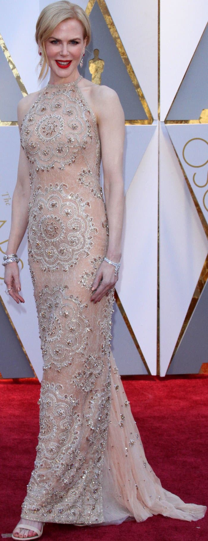 Nicole Kidman wearing a nude Armani Privé embellished column gown at the 2017 Oscars