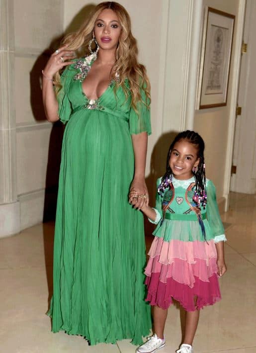 Beyonce and Blue Ivy wearing matching Gucci frocks.