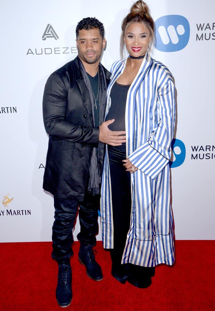 Russell Wilson, left, and Ciara attend the Warner Music Group’s Celebration of the 59th Annual Grammy Awards