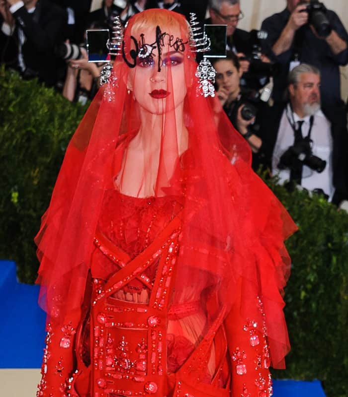 Katy Perry wearing a fiery-red Maison Margiela Spring 2017 Couture dress at the 2017 Metropolitan Costume Institute Benefit Gala held at the Metropolitan Museum of Art in New York City, on May 1, 2017