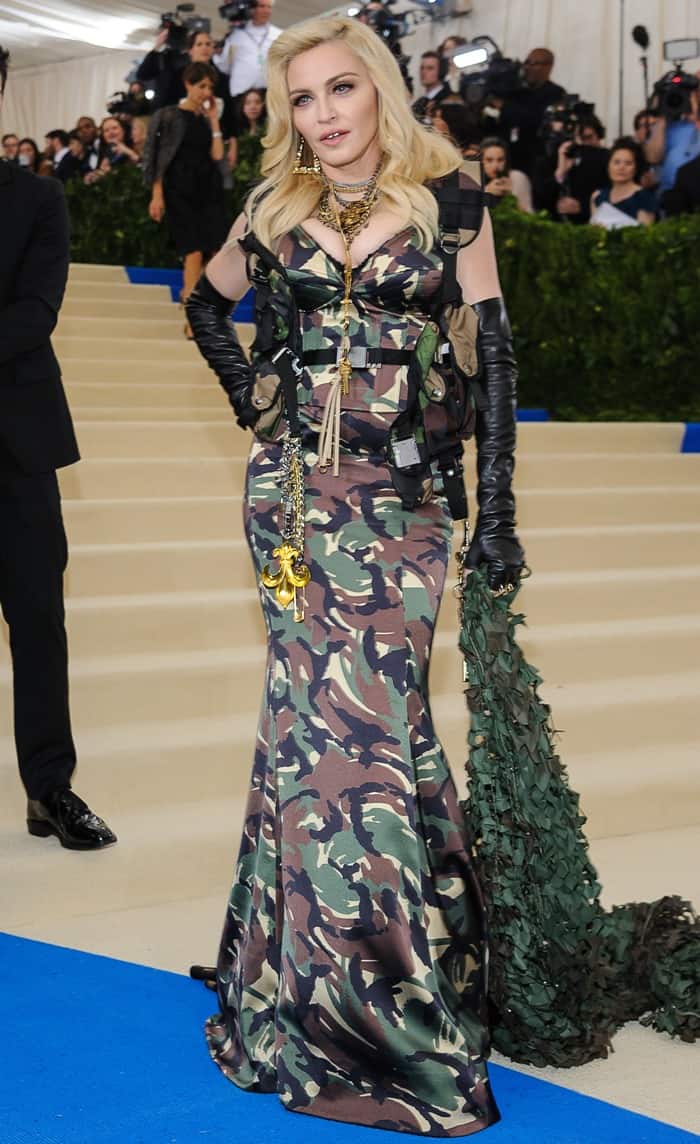Madonna wearing a full length camouflage Moschino gown at the 2017 Met Gala in New York City on May 1, 2017