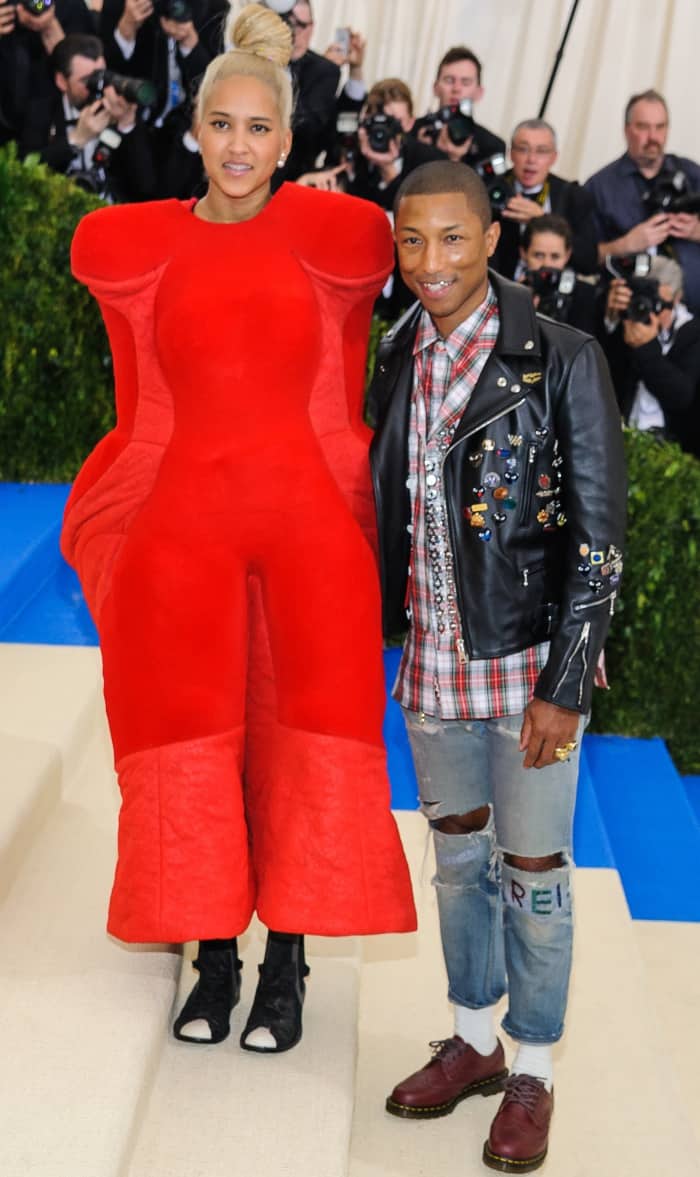 Helen Lasichanh and Pharrell Williams wearing Comme des Garçons at the 2017 Met Gala