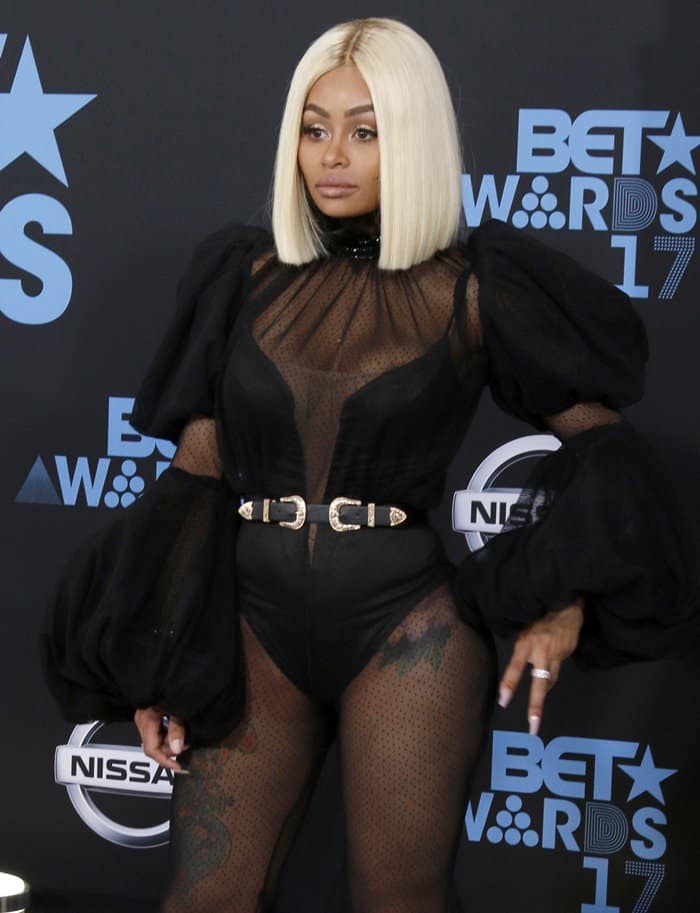 Blac Chyna revealed her infamous figure in a sheer jumpsuit.
